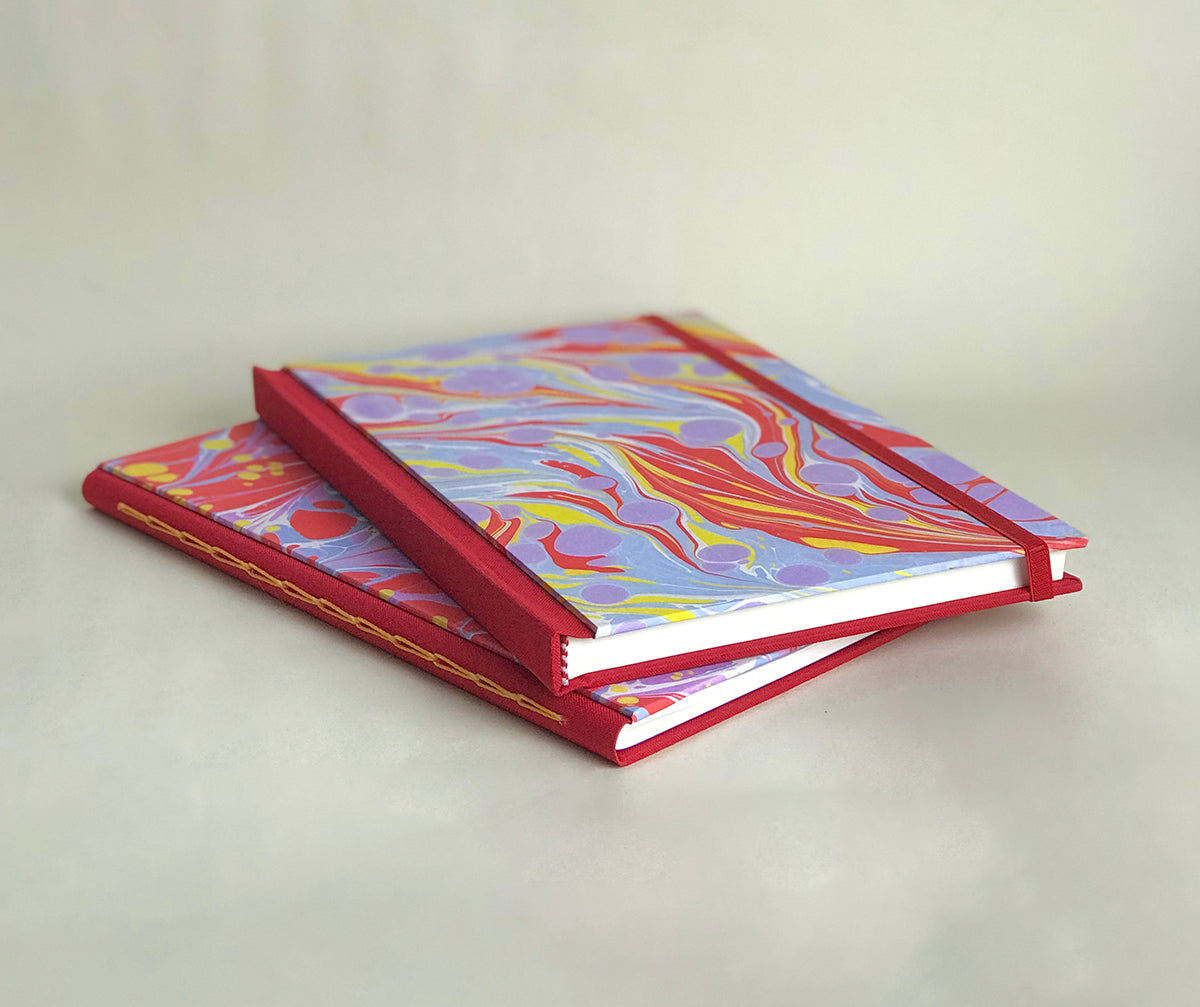 Journal marbré - Rouge, jaune et lilas